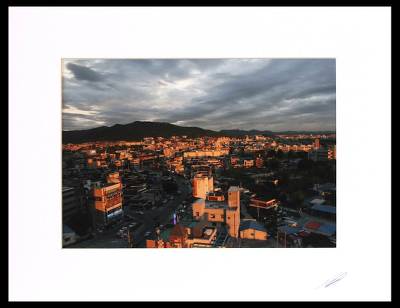 , "Sunset over the City"